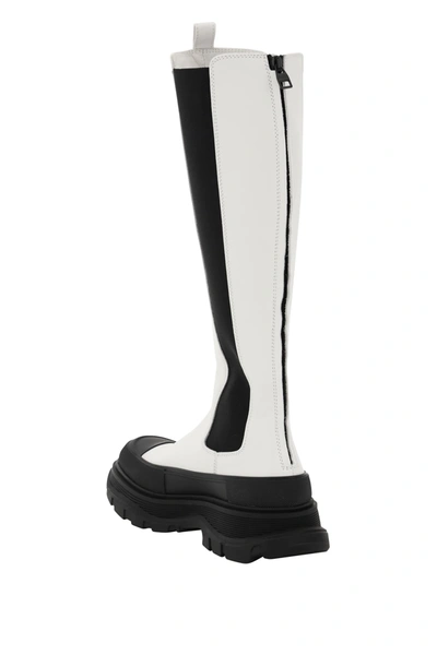Shop Alexander Mcqueen Tread Slick Knee High Boots In White,black
