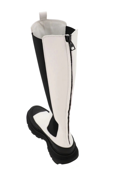 Shop Alexander Mcqueen Tread Slick Knee High Boots In White,black