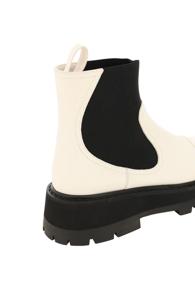 Shop Jimmy Choo Clayton Boots In White,black