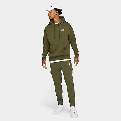 Shop Nike Men's Sportswear Club Fleece Cargo Jogger Pants In Rough Green/rough Green/white