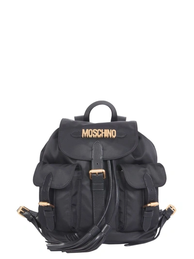 Shop Moschino Logo Plaque Tassled Backpack In Black