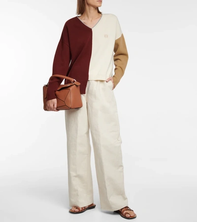 Shop Loewe Cotton And Linen Flared Pants In Neutrals