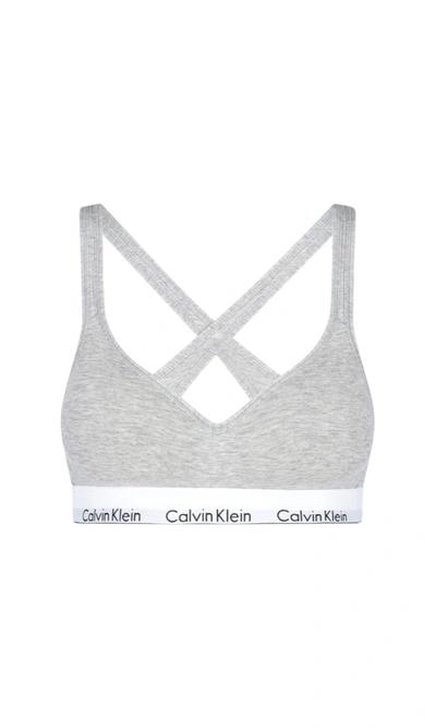 Shop Calvin Klein Logo Padded Bralette In Gray