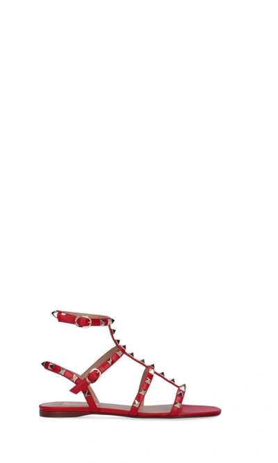 Shop Valentino Flat Rockstud Sandals In Red