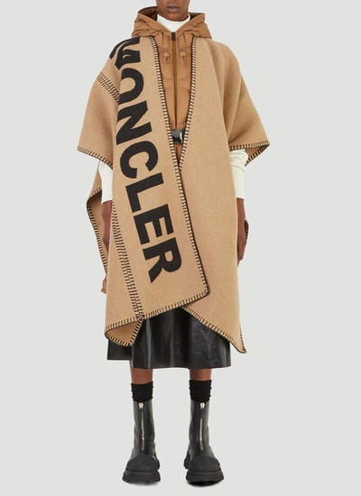 Shop Moncler Logo Print Knitted Cape In Brown