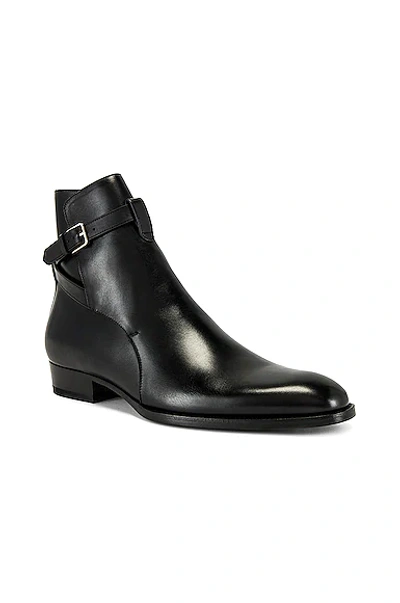 Saint Laurent Buckle-fastened Ankle Boots In Nero