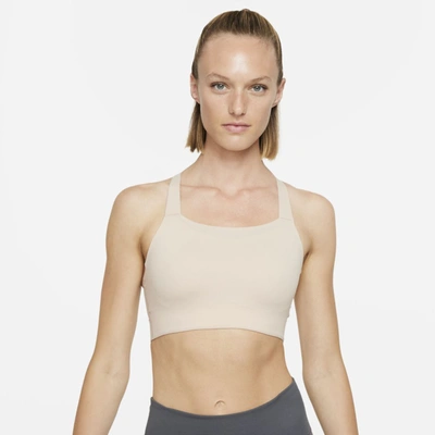 Shop Nike Dri-fit Swoosh Women's Medium-support Padded Sports Bra In Particle Beige,orange Pearl