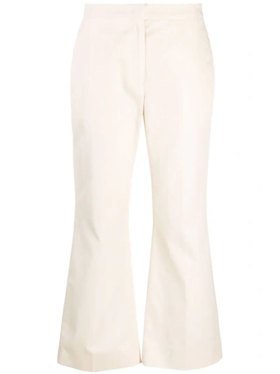 Shop Jil Sander Cropped Press-crease Flared Trousers In Weiss