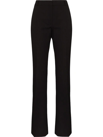 Shop Frame Le High Flared Trousers In Schwarz