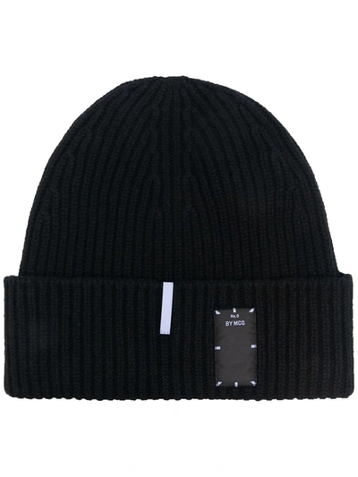 Shop Mcq By Alexander Mcqueen Logo-patch Ribbed Wool Beanie In Schwarz