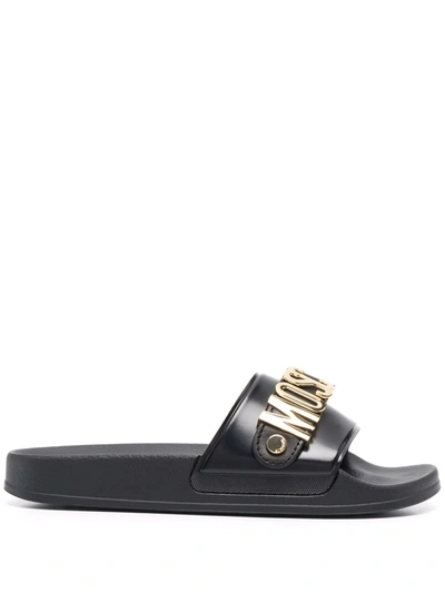 Shop Moschino Logo-plaque Slides In Schwarz