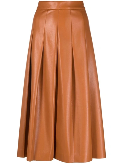 Shop Msgm Pleated Faux-leather Midi Skirt In Braun