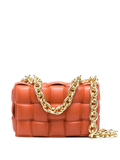 Shop Bottega Veneta Chain Cassette Shoulder Bag In Orange