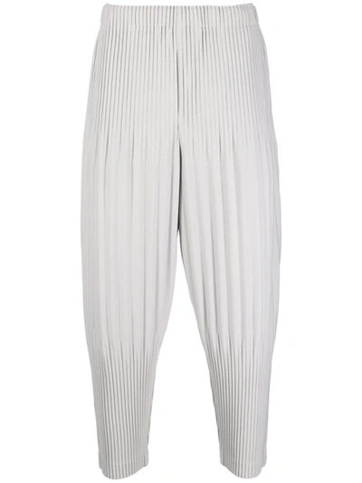 Shop Issey Miyake Tapered Plissé Trousers In Grau