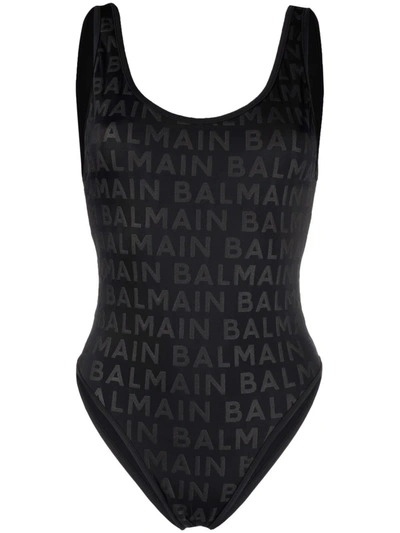 Shop Balmain All-over Monogram Swimsuit In Schwarz