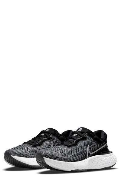 Shop Nike Zoomx Invincible Run Flyknit Running Shoe In White/ Black