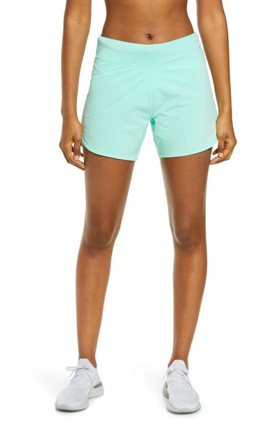 Shop Nike Eclipse Running Shorts In Green Glow/ Reflective Silver