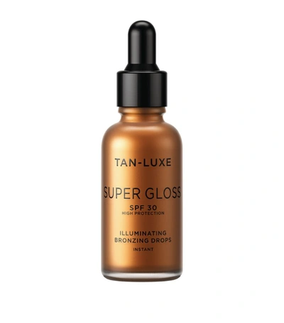 Shop Tan-luxe Super Gloss Illuminating Bronzing Drops Spf30 (30ml) In Brown