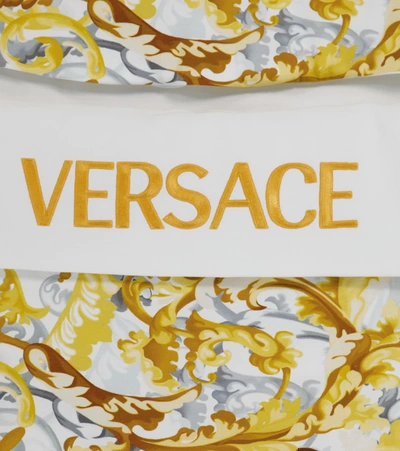 Shop Versace Baby Printed Bunting Bag In 白色