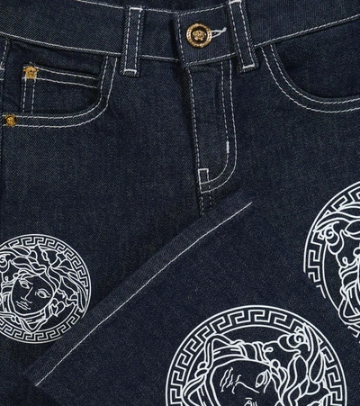 Shop Versace Medusa Amplified Flared Jeans In 蓝色
