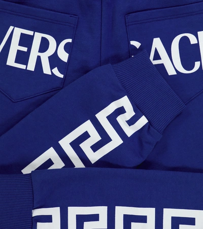 Shop Versace Greca Cotton Sweatpants In 蓝色