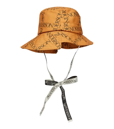 Jw Anderson Logo Asymmetric Bucket Hat In Brown | ModeSens