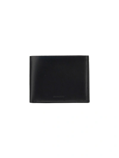 Shop Jil Sander Logo Debossed Bifold Wallet In Black