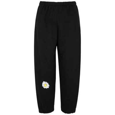 Shop Natasha Zinko Daisy-print Distressed Cotton-blend Sweatpants In Black