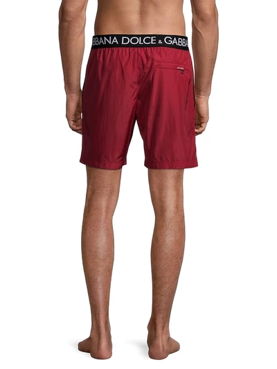 Shop Dolce & Gabbana Logo Waistband Swim Trunks In Red