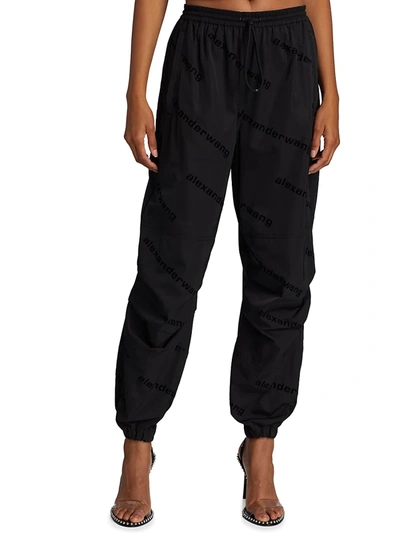 Shop Alexander Wang Women's Allover Flocked Logo Track Pants In Black