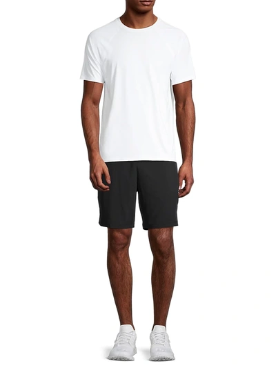 Shop Alo Yoga 7" Unity 2-in-1 Fleece Shorts In White