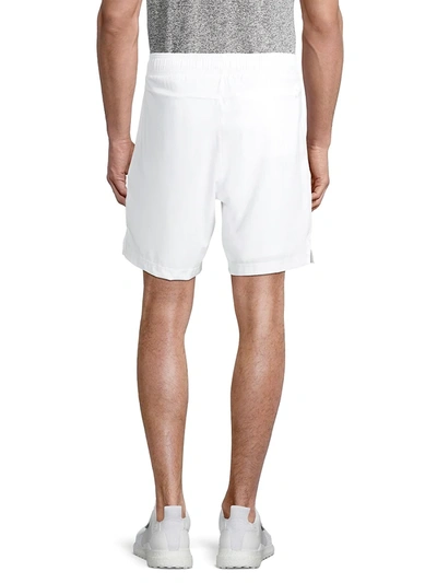 Shop Alo Yoga 7" Unity 2-in-1 Fleece Shorts In White