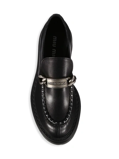 Shop Miu Miu Leather Lug Sole Driver Loafers In Nero