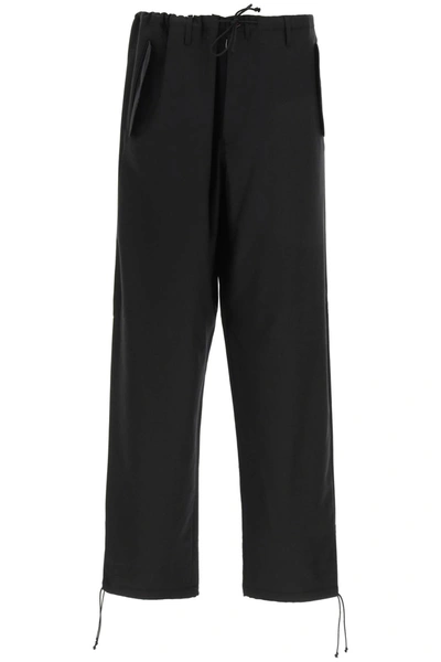 Shop Maison Margiela Wool Blend Trousers With Drawstring In Black (black)