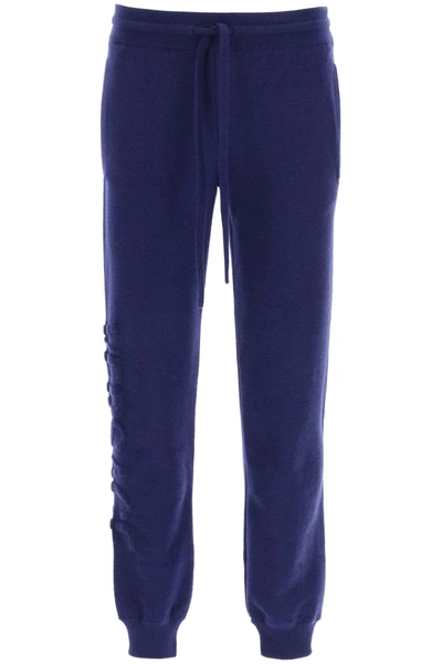 Shop Versace Jogger Pants With Embossed Logo In Lapis (purple)