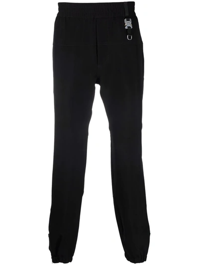 Shop Alyx Buckle-detail Tapered Track Pants In Black