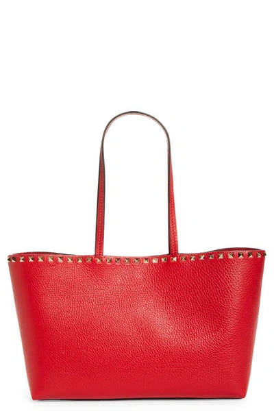 Shop Valentino Small Rockstud Leather Tote In Rouge