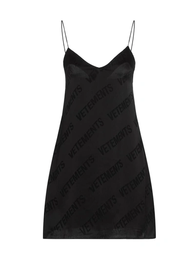 Shop Vetements Logo Mini Dress In Black