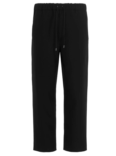 Shop Oamc Drawcord Pants In Black