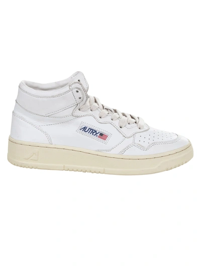 Shop Autry Logo Patched Mid Sneakers In White
