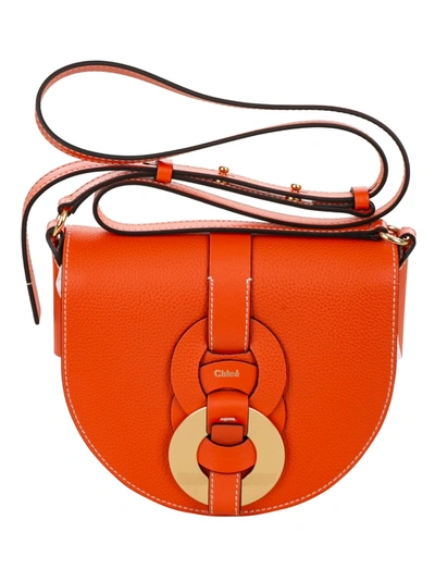 Shop Chloé Darryl Saddle Bag In Radiant Orange