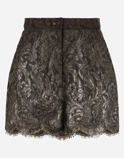 Shop Dolce & Gabbana Laminated Lace Shorts In Black