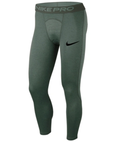 Shop Nike Men's Pro Dri-fit Cropped Leggings In Galactic Jade