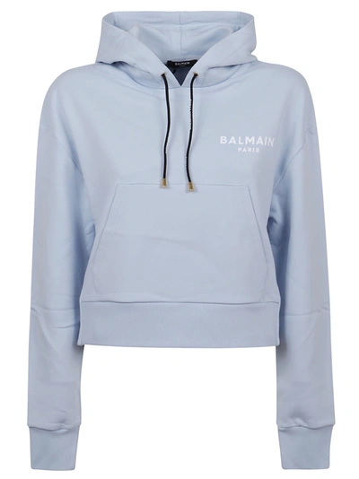 Shop Balmain Cropped Flocked Logo Detail Hoodie In Sdk Bleu Pale Blanc