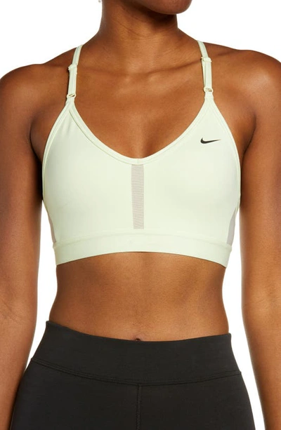 Shop Nike Indy Mesh Inset Sports Bra In Lime Ice/rattan/lime Ice/black