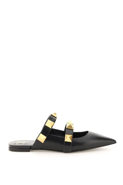 Shop Valentino Roman Stud Flat Mules In Black