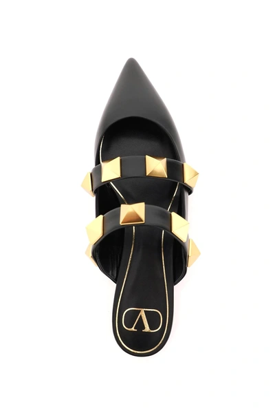 Shop Valentino Roman Stud Flat Mules In Black