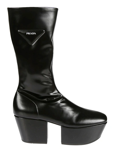 Shop Prada Logo Embossed Side Zip Boots In Black