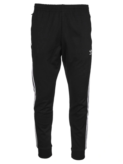 Shop Adidas Originals Side Stripe Track Pants In Black