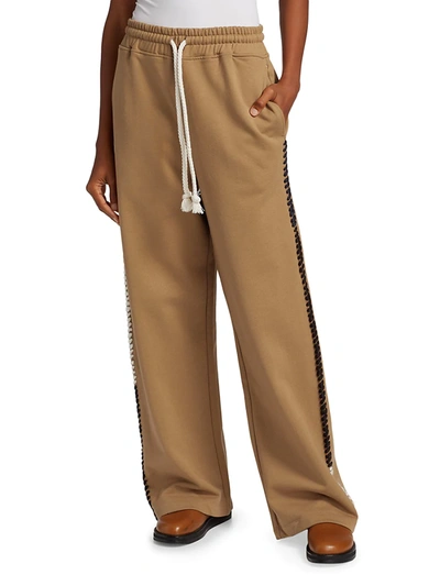 Shop Jw Anderson Contrast Stitch Track Pants In Tobacco